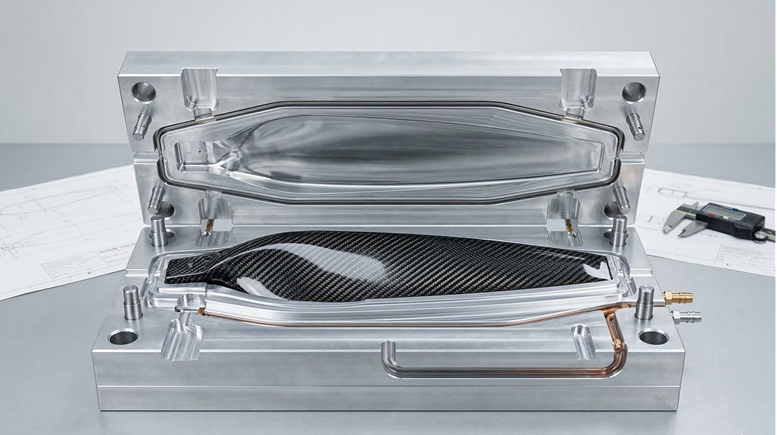 Custom carbon fiber propeller mold for design, development, and batch manufacturing